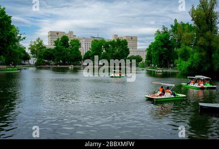 May 22, 2018, Moscow, Russia. Vacationers ride catamarans on the Big Golitsyn pond in Gorky Park in Moscow. Stock Photo