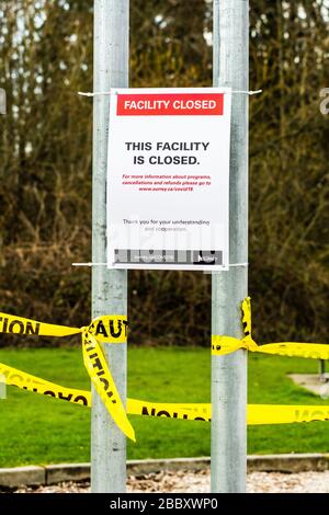 Surrey, Canada - Mar 29, 2020: Children's playground closed due to Coronavirus Covid-19 epidemic Stock Photo