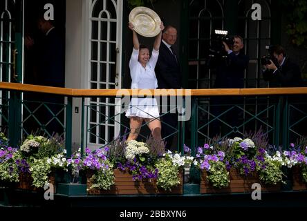 London, UK. 13th July, 2019. File photo taken on July 13, 2019 shows Simona Halep of Romania celebrating at the club's balcony after winning the women's singles final match with Serena Williams of the United States at the 2019 Wimbledon Tennis Championships in London, Britain. This year's Wimbledon has been cancelled due to the public health concerns related to the ongoing COVID-19 pandemic, the All England Club (AELTC) announced after an emergency meeting on Wednesday. Credit: Han Yan/Xinhua/Alamy Live News Stock Photo