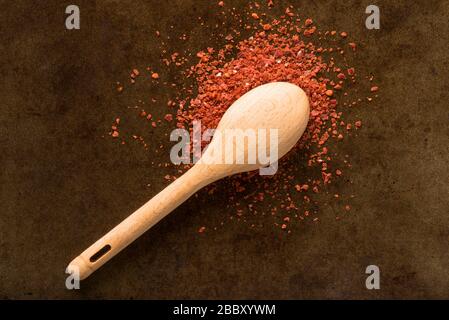 Aleppo Peppers Spilled from a Teaspoon Stock Photo