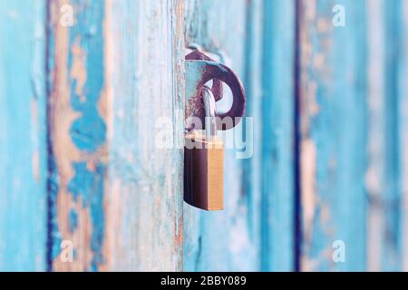 padlock on closed door Stock Photo
