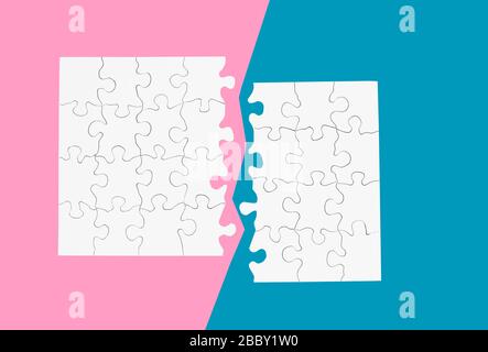 Blank white puzzle with pieces split apart isolated on pink and teal Stock Photo