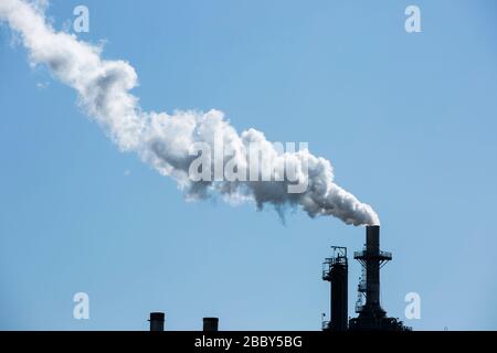 Oil refineries spew carbon dioxide gas. Stock Photo