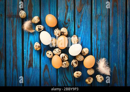 Easter, easter eggs, Easter background, willow branches, wicker bag, rustic wooden, life photo, copy space Stock Photo