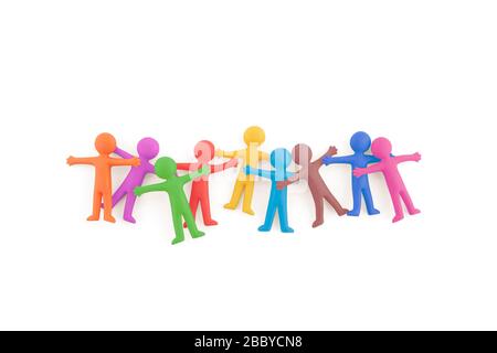 Group of colorful people figures sticking together on white background with clipping path Stock Photo