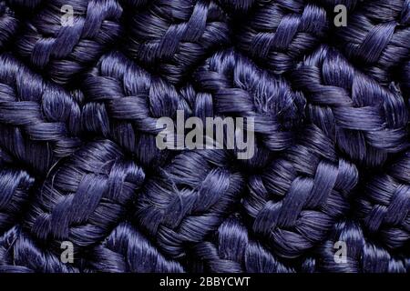 Loops on a knitted blue fabric, background Stock Photo