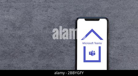 Rotterdam, The Netherlands - April 2020: Smartphone with Microsoft Teams App Logo inside House video conferencing service Work at Home Quarantine or L Stock Photo