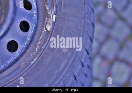 tire change in summer, black tires close-up Stock Photo