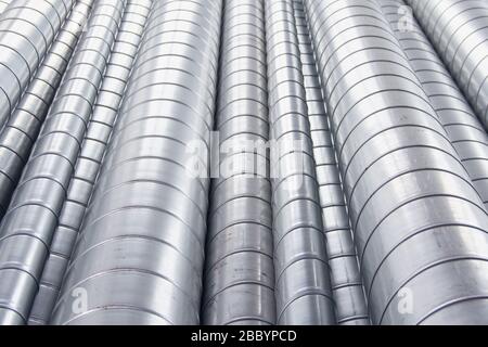 Steel pipes for ventilation system. Ventilation ducts components Construction equipment. Stock Photo