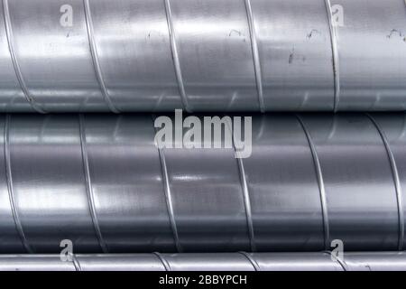 Steel pipes for ventilation system. Ventilation ducts components Construction equipment. Stock Photo