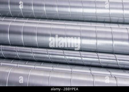 Steel pipes for ventilation system. Ventilation ducts components Construction equipment. Stock Photo
