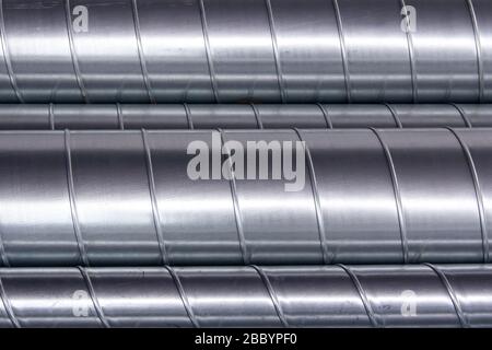 Steel pipes for ventilation system. Ventilation ducts components Construction equipment. Stock Photo