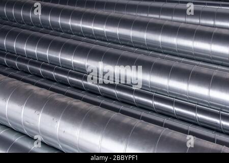 Steel pipes for ventilation system. Ventilation ducts components Construction equipment. Stock Photo