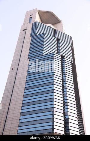 OSAKA, JAPAN - APRIL 24, 2012: Nissei Dowa Sompo Phoenix Tower skyscraper in Osaka, Japan. It was designed by Nikken Sekkei architectural firm. Stock Photo