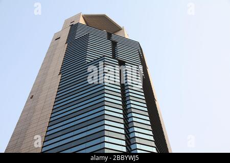 OSAKA, JAPAN - APRIL 24, 2012: Nissei Dowa Sompo Phoenix Tower skyscraper in Osaka, Japan. It was designed by Nikken Sekkei architectural firm. Stock Photo