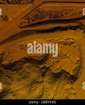 DEM - digital elevation model. Gis product made after proccesing pictures taken from a drone. It shows excavation site with steep rock walls Stock Photo