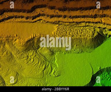 DEM - digital elevation model. Gis product made after proccesing pictures taken from a drone. It shows excavation site with steep rock walls Stock Photo