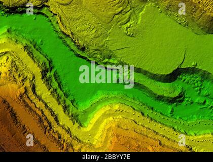 DEM - digital elevation model. Gis product made after proccesing pictures taken from a drone. It shows excavation site with steep rock walls Stock Photo