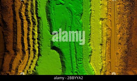 DEM - digital elevation model. Gis product made after proccesing pictures taken from a drone. It shows excavation site with steep rock walls Stock Photo