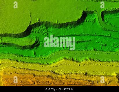 DEM - digital elevation model. Gis product made after proccesing pictures taken from a drone. It shows excavation site with steep rock walls Stock Photo