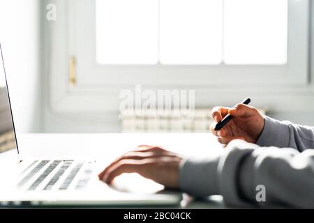 Young man designer using graphics tablet while working with computer. Stock Photo