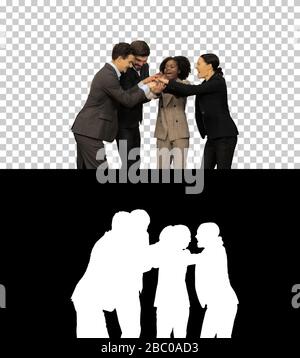 Diverse adult business people joining hands together Team spirit Stock Photo