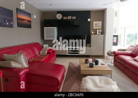 Living room with red sofa Stock Photo