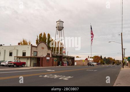 Old water tank and local businesses on Main Street in Merrill Stock Photo