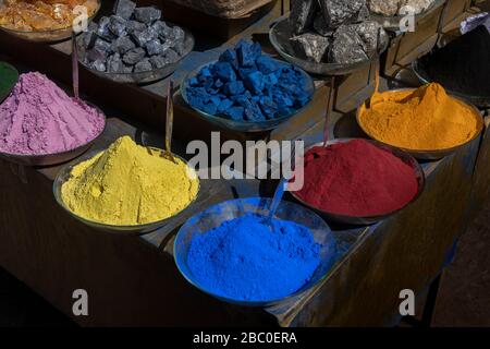 Colorful dye pigments and minerals in the medina of Marrakech, Morocco. Pigments for dyeing fabrics, silk, cotton, and yarn, etc. Stock Photo