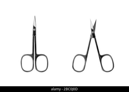 Silver metal closed and open scissors set on white background isolated closeup, steel cutting tool for manicure, cuticle clippers, nail cut shears Stock Photo