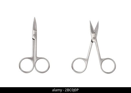 Silver metal closed and open scissors set on white background isolated closeup, steel cutting tool for manicure, cuticle clippers, nail cut shears Stock Photo