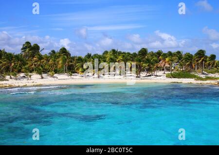 Sandy beach in Mahahual village, Costa Maya, Mexico. Mahahual is now a rapidly developing tourist center. Stock Photo