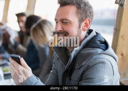 Man texting with smart phone Stock Photo