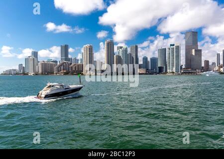 USA, Florida, skyline of Downtown Miami with motorboat on the water Stock Photo