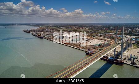 Mozambique, Katembe, Aerial view of container ship sailing under Maputo-Katembe Bridge Stock Photo