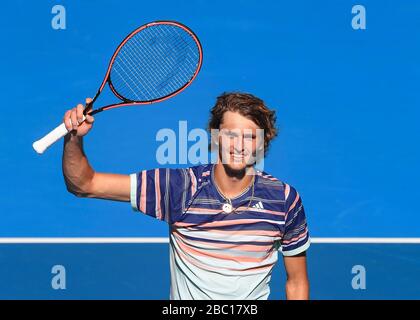 German tennis player Alexander Zverev (GER) waving his racket after winning a match at the Australian Open 2020Tennis Tournament, Melbourne Park, Melb Stock Photo