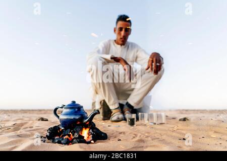 Preparing tea in Sahara desert, Tindouf, Algeria Stock Photo