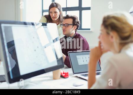 Architects working in office Stock Photo