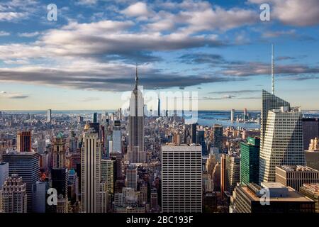 USA, New York, New York City, Helicopter view of Manhattan skyline at dusk Stock Photo