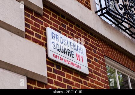 MAYFAIR, LONDON- Grosvenor Square street sign. Location of American Embassy in London and the Millennium Hotel Stock Photo