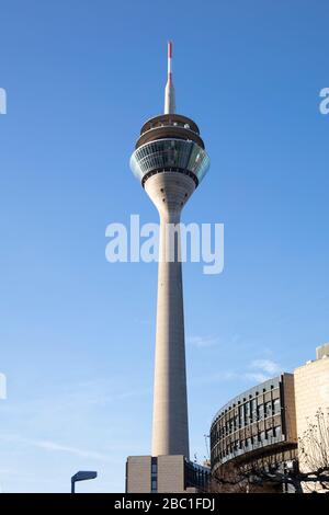 Germany, North Rhine-Westphalia, Dusseldorf, Low angle view of Rheinturm tower standing against clear sky Stock Photo