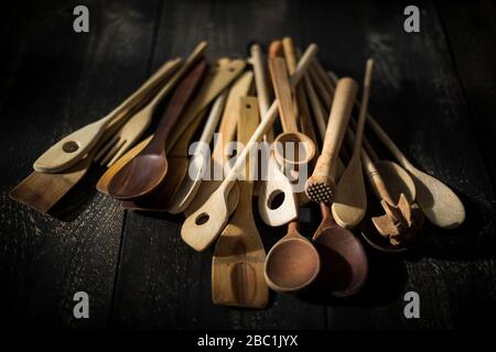 Pile of various wooden kitchen utensils Stock Photo