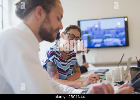 Architects working in conference room meeting Stock Photo