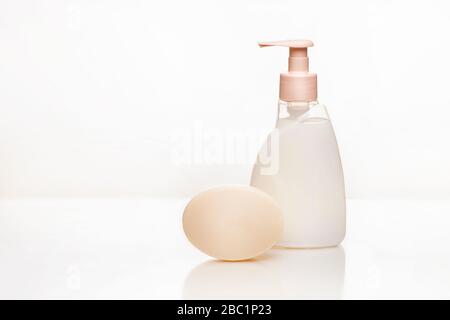 antibacterial soap and cream soap on a white background. For hand disinfection and treatment. copy space. Stock Photo