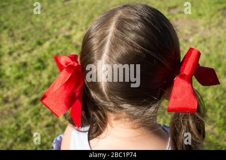 Hair ribbons hi-res stock photography and images - Alamy