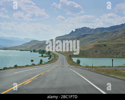 Scenic drive along North Fork Highway with the Buffalo Bill Reservoir and Dam along the road. Stock Photo