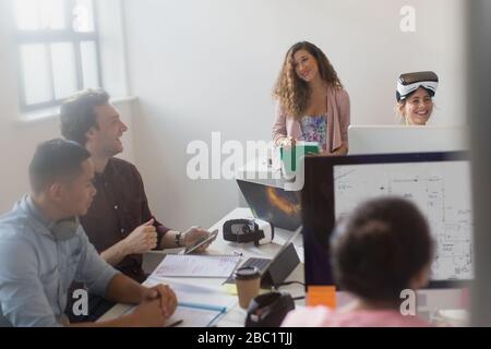 Computer programmers and designers working in office Stock Photo