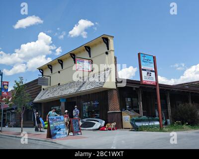 Driggs, Idaho- August 2018: Facade of shops and stores with people walking on the streetside in Driggs. Stock Photo