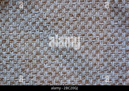 The texture of the fabric. White and brown checkered fabric. Copy space. Stock Photo