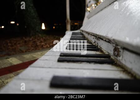 Old piano keyboard background with selective focus Stock Photo